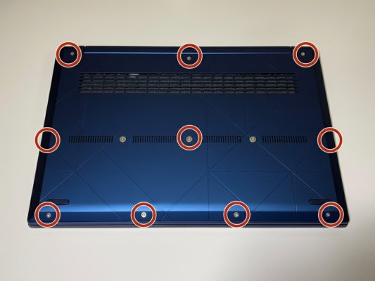 Laptop upside down on a towel for repair